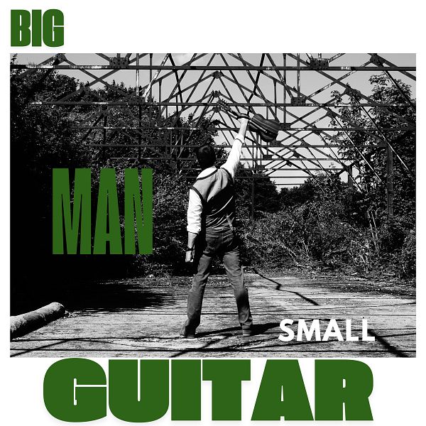 Big man with Small guitar